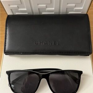 CHANEL Elegant Black Sunglasses with Case